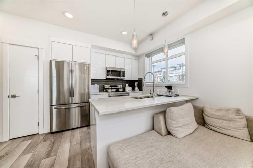 3112-410 Seton Passage Se, Calgary, AB - Indoor Photo Showing Kitchen With Stainless Steel Kitchen