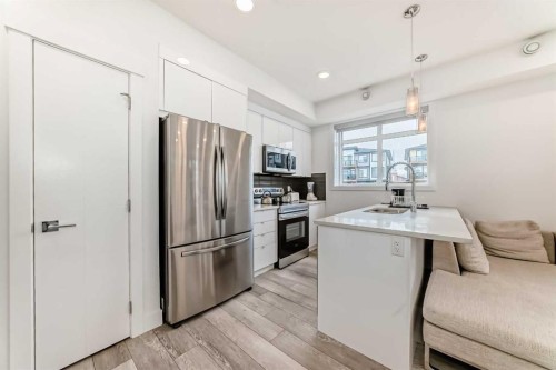 3112-410 Seton Passage Se, Calgary, AB - Indoor Photo Showing Kitchen With Stainless Steel Kitchen