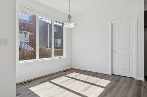 25 Yorkstone Row Sw, Calgary, AB - Indoor Photo Showing Other Room