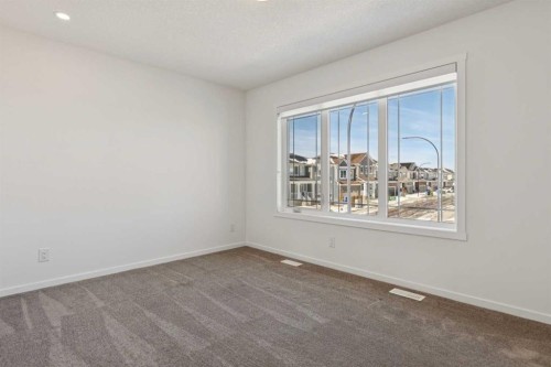 25 Yorkstone Row Sw, Calgary, AB - Indoor Photo Showing Other Room