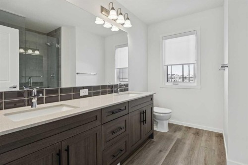 25 Yorkstone Row Sw, Calgary, AB - Indoor Photo Showing Bathroom