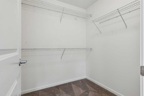 25 Yorkstone Row Sw, Calgary, AB - Indoor With Storage