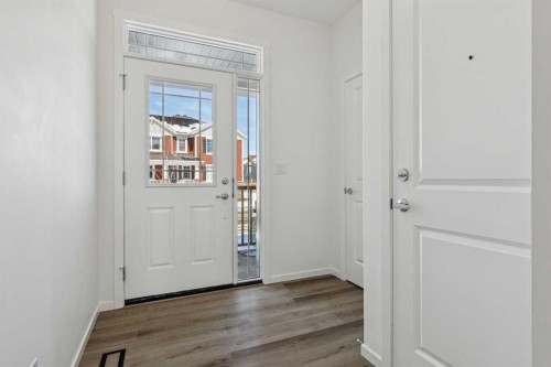 25 Yorkstone Row Sw, Calgary, AB - Indoor Photo Showing Other Room