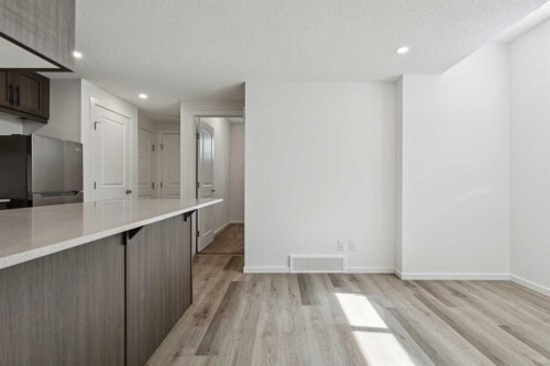 25 Yorkstone Row Sw, Calgary, AB - Indoor Photo Showing Other Room