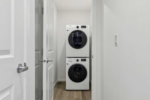 25 Yorkstone Row Sw, Calgary, AB - Indoor Photo Showing Laundry Room