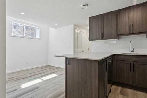 25 Yorkstone Row Sw, Calgary, AB - Indoor Photo Showing Kitchen