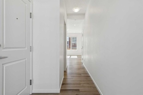 25 Yorkstone Row Sw, Calgary, AB - Indoor Photo Showing Other Room