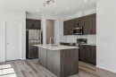 25 Yorkstone Row Sw, Calgary, AB  - Indoor Photo Showing Kitchen 