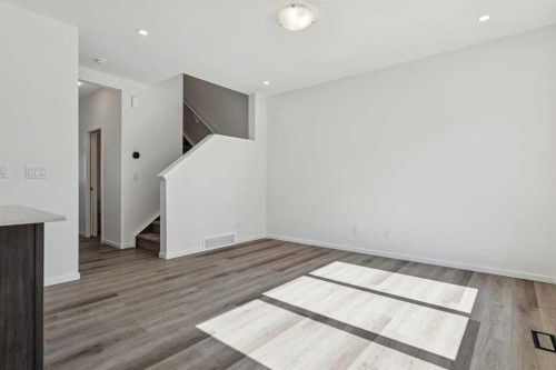 25 Yorkstone Row Sw, Calgary, AB - Indoor Photo Showing Other Room