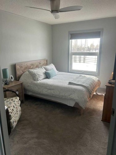270165 Range Road 291 Se, Airdrie, AB - Indoor Photo Showing Bedroom