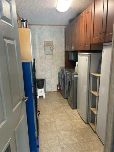 270165 Range Road 291 Se, Airdrie, AB - Indoor Photo Showing Laundry Room