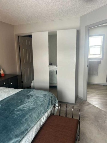 270165 Range Road 291 Se, Airdrie, AB - Indoor Photo Showing Bedroom