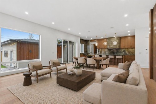 209 Windermere Road Sw, Calgary, AB - Indoor Photo Showing Living Room