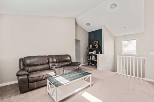 65 Sunrise Crescent, Cochrane, AB - Indoor Photo Showing Living Room