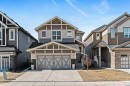65 Sunrise Crescent, Cochrane, AB  - Outdoor With Facade 