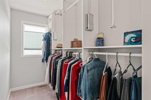 65 Sunrise Crescent, Cochrane, AB - Indoor With Storage