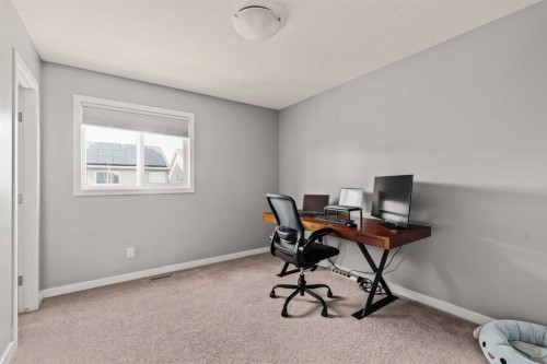 65 Sunrise Crescent, Cochrane, AB - Indoor Photo Showing Office