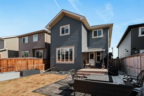 65 Sunrise Crescent, Cochrane, AB - Outdoor With Deck Patio Veranda With Exterior