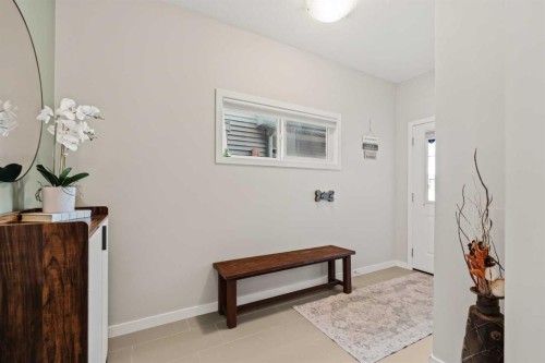 65 Sunrise Crescent, Cochrane, AB - Indoor Photo Showing Other Room