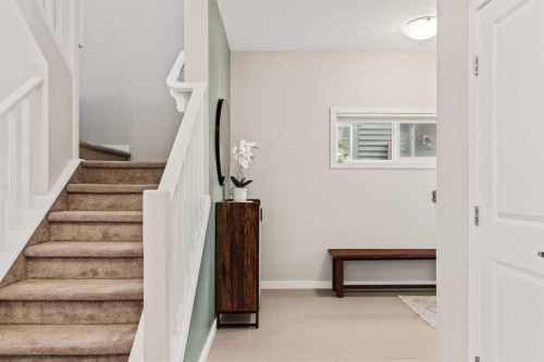 65 Sunrise Crescent, Cochrane, AB - Indoor Photo Showing Other Room