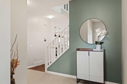 65 Sunrise Crescent, Cochrane, AB - Indoor Photo Showing Other Room