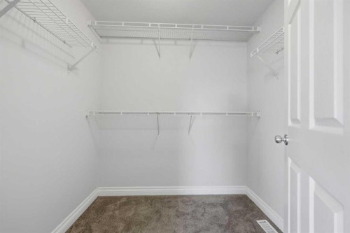 172 Somme Manor Sw, Calgary, AB - Indoor With Storage