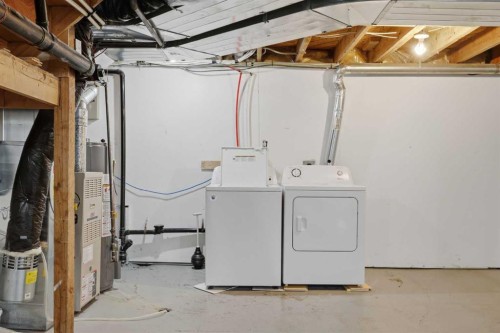 172 Somme Manor Sw, Calgary, AB - Indoor Photo Showing Laundry Room