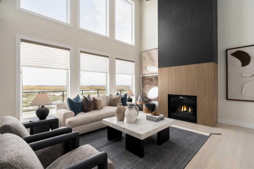 110 Herron Way Ne, Calgary, AB - Indoor Photo Showing Living Room With Fireplace