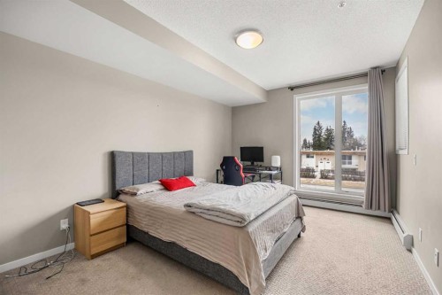 208-4818 Varsity Drive Nw, Calgary, AB - Indoor Photo Showing Bedroom