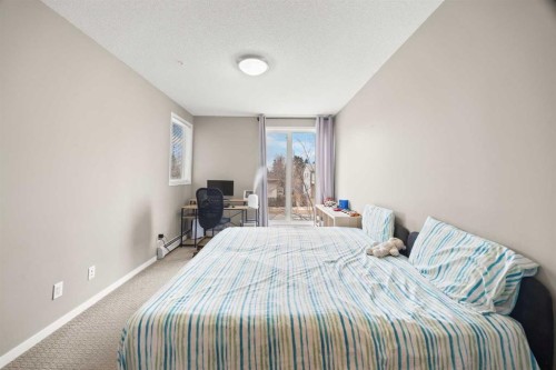 208-4818 Varsity Drive Nw, Calgary, AB - Indoor Photo Showing Bedroom