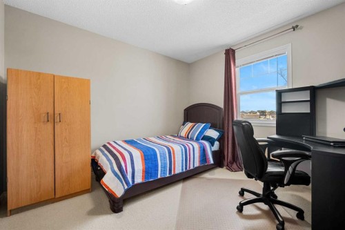 83 Saddlebrook Gardens Ne, Calgary, AB - Indoor Photo Showing Bedroom