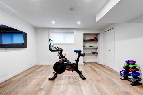 6755 Livingstone Drive Sw, Calgary, AB - Indoor Photo Showing Gym Room