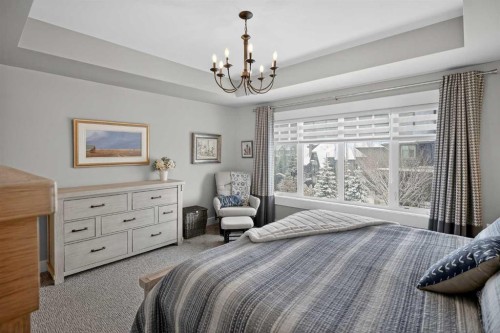 616 Coopers Crescent Sw, Airdrie, AB - Indoor Photo Showing Bedroom