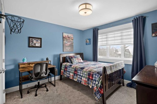 616 Coopers Crescent Sw, Airdrie, AB - Indoor Photo Showing Bedroom