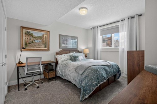 616 Coopers Crescent Sw, Airdrie, AB - Indoor Photo Showing Bedroom