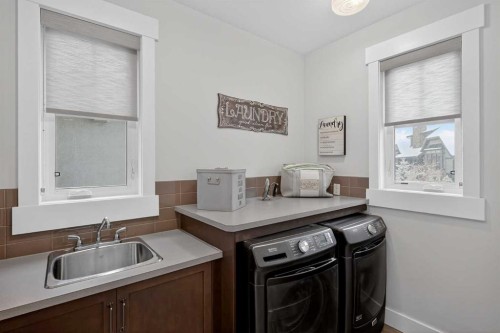 616 Coopers Crescent Sw, Airdrie, AB - Indoor Photo Showing Laundry Room