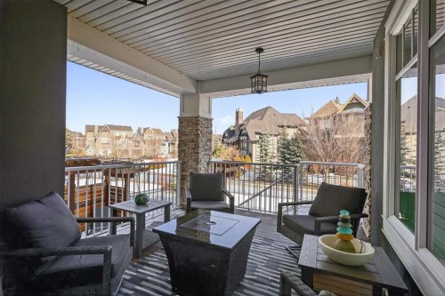 616 Coopers Crescent Sw, Airdrie, AB - Outdoor With Deck Patio Veranda With Exterior