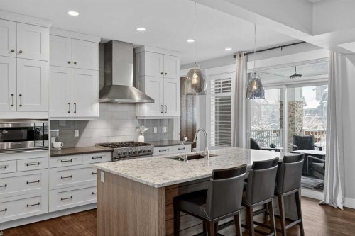 616 Coopers Crescent Sw, Airdrie, AB - Indoor Photo Showing Kitchen With Upgraded Kitchen