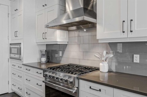 616 Coopers Crescent Sw, Airdrie, AB - Indoor Photo Showing Kitchen With Upgraded Kitchen