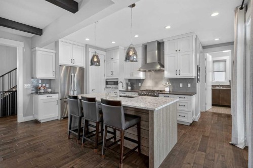 616 Coopers Crescent Sw, Airdrie, AB - Indoor Photo Showing Kitchen With Stainless Steel Kitchen With Upgraded Kitchen