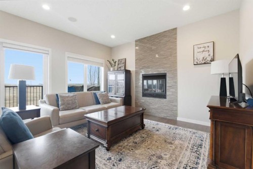 52 Walden Green Se, Calgary, AB - Indoor Photo Showing Living Room With Fireplace