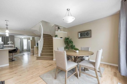 1005 New Brighton Gardens Se, Calgary, AB - Indoor Photo Showing Dining Room