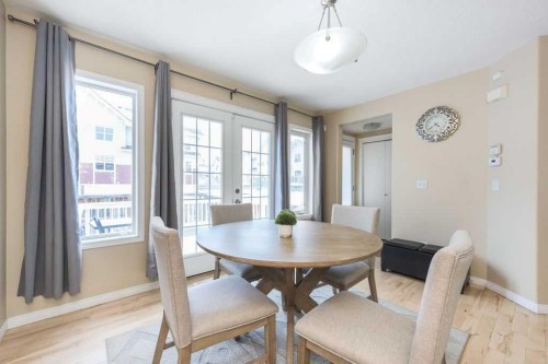 1005 New Brighton Gardens Se, Calgary, AB - Indoor Photo Showing Dining Room