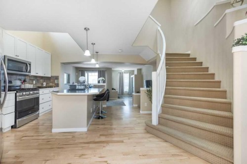 1005 New Brighton Gardens Se, Calgary, AB - Indoor Photo Showing Kitchen With Upgraded Kitchen