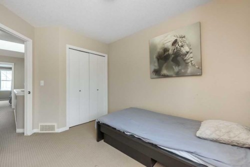 1005 New Brighton Gardens Se, Calgary, AB - Indoor Photo Showing Bedroom