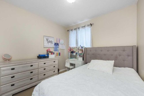 1005 New Brighton Gardens Se, Calgary, AB - Indoor Photo Showing Bedroom