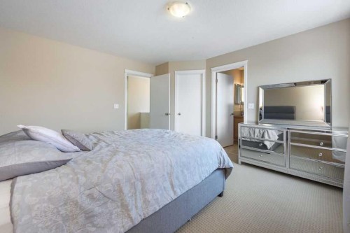1005 New Brighton Gardens Se, Calgary, AB - Indoor Photo Showing Bedroom