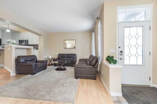 1005 New Brighton Gardens Se, Calgary, AB - Indoor Photo Showing Living Room