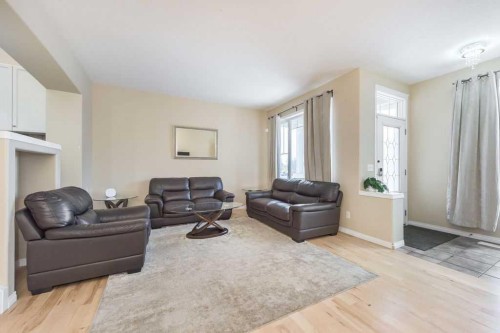 1005 New Brighton Gardens Se, Calgary, AB - Indoor Photo Showing Living Room