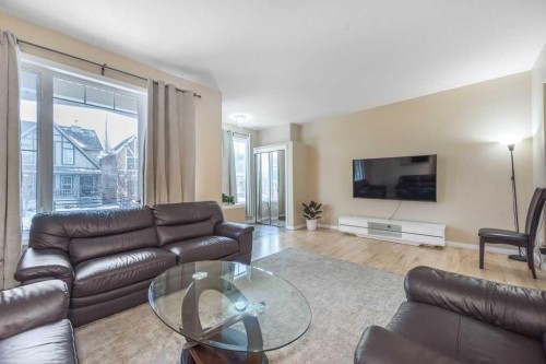 1005 New Brighton Gardens Se, Calgary, AB - Indoor Photo Showing Living Room